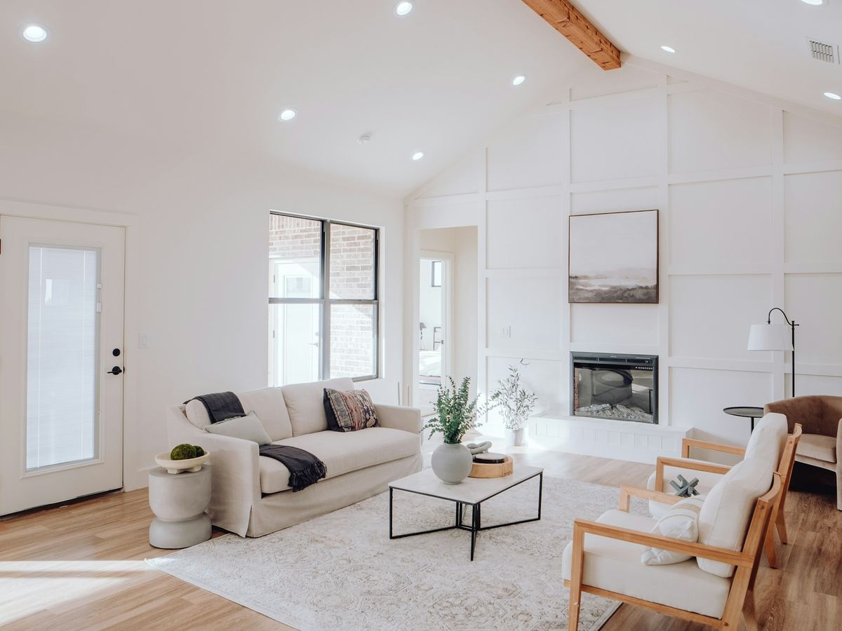 A bright, well-kept living room with a clean rug